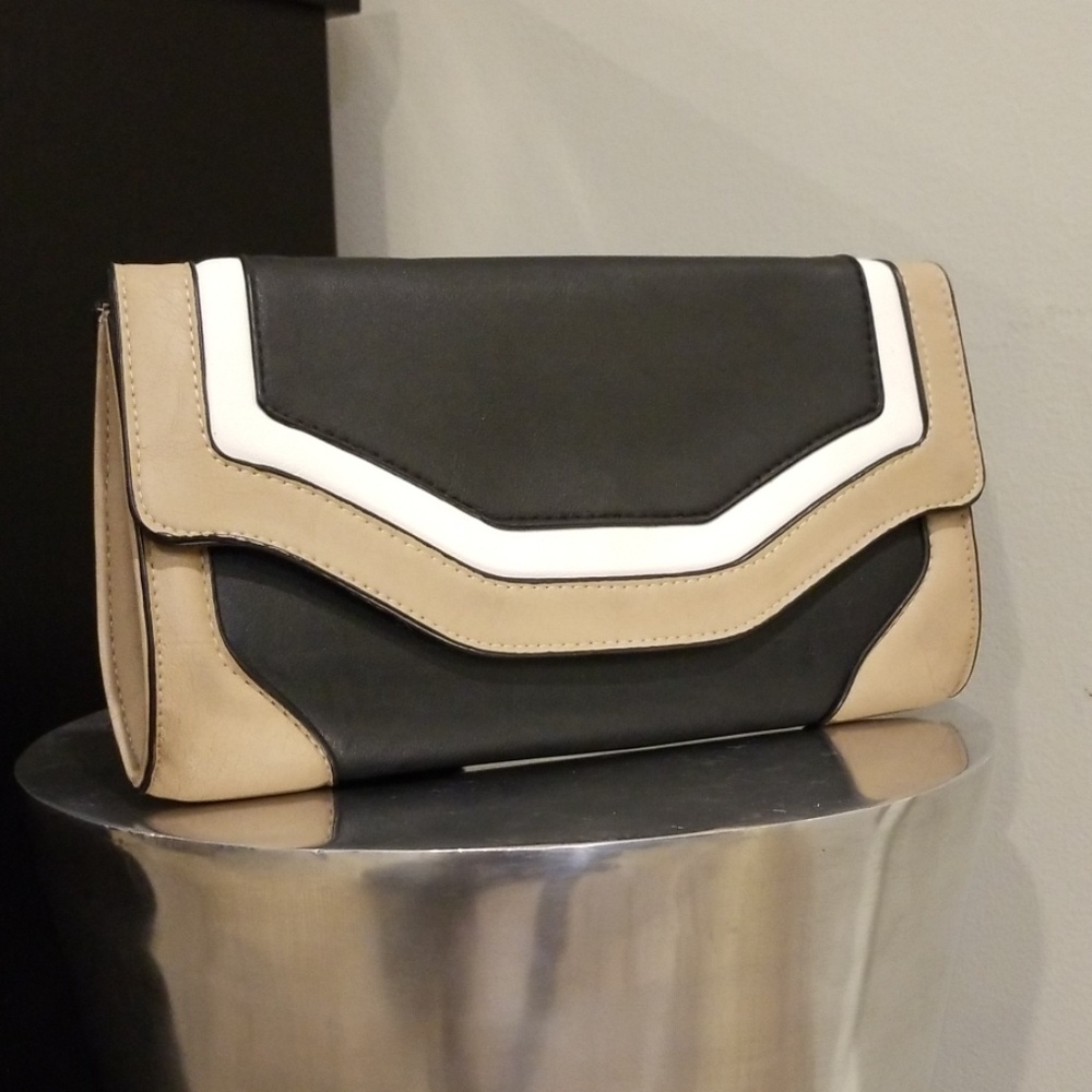 Black white and tan clutch with removable chain